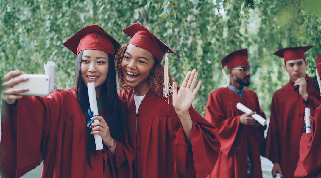 happy students celebrating success