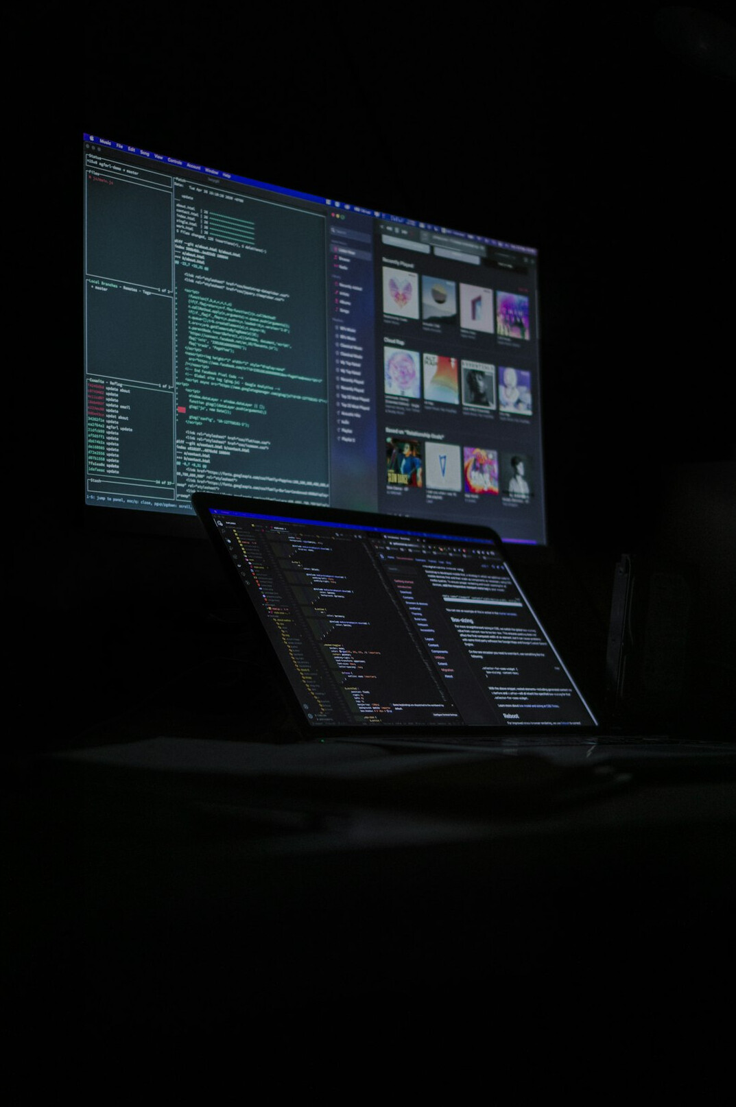 coding on laptop at desk